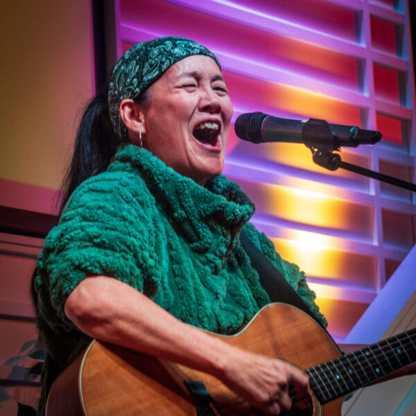 Kim-Char Meredith performing at the Shore Road Open Mic in Naperville IL, April 2006